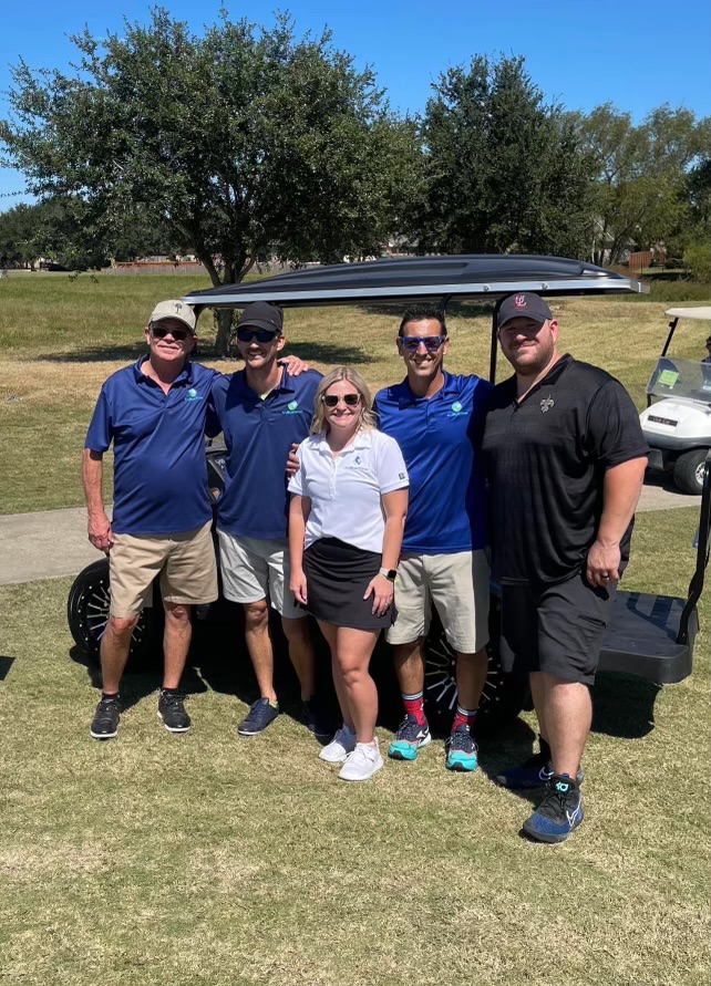 TruBlue Water team at a community golf tournament